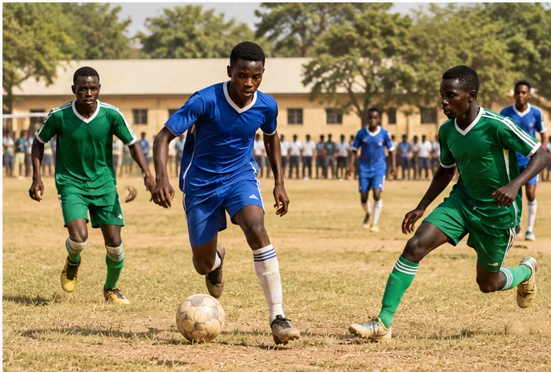 Secondary school students playing football on a school field